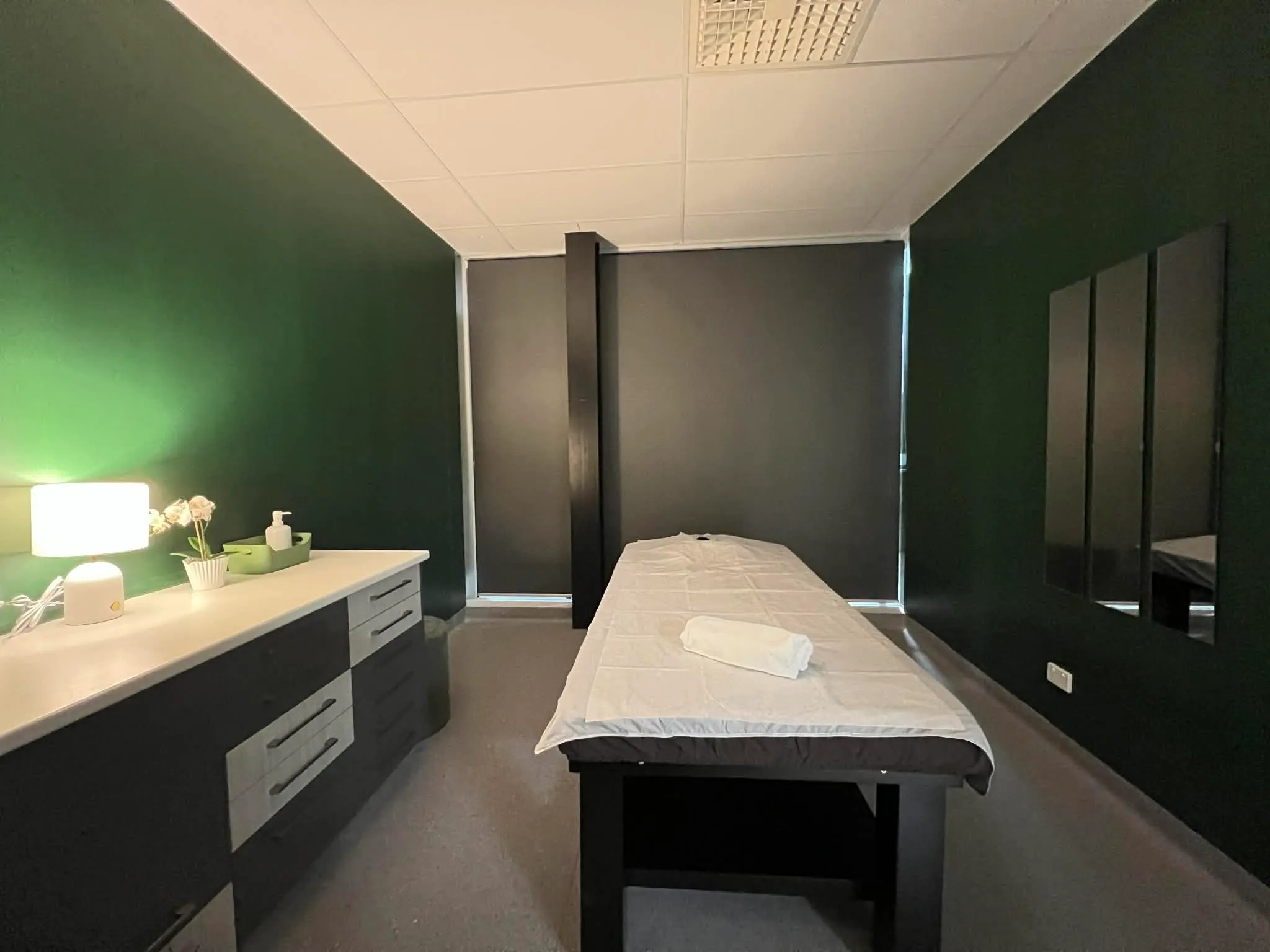 Calm Thai-inspired waiting area at Bliss Massage